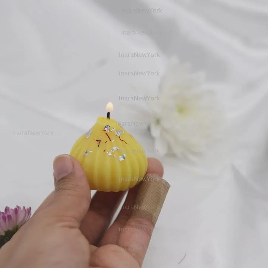 10 box with orange ladoo, kaju katli, gujiya, and yellow modak (40pcs)