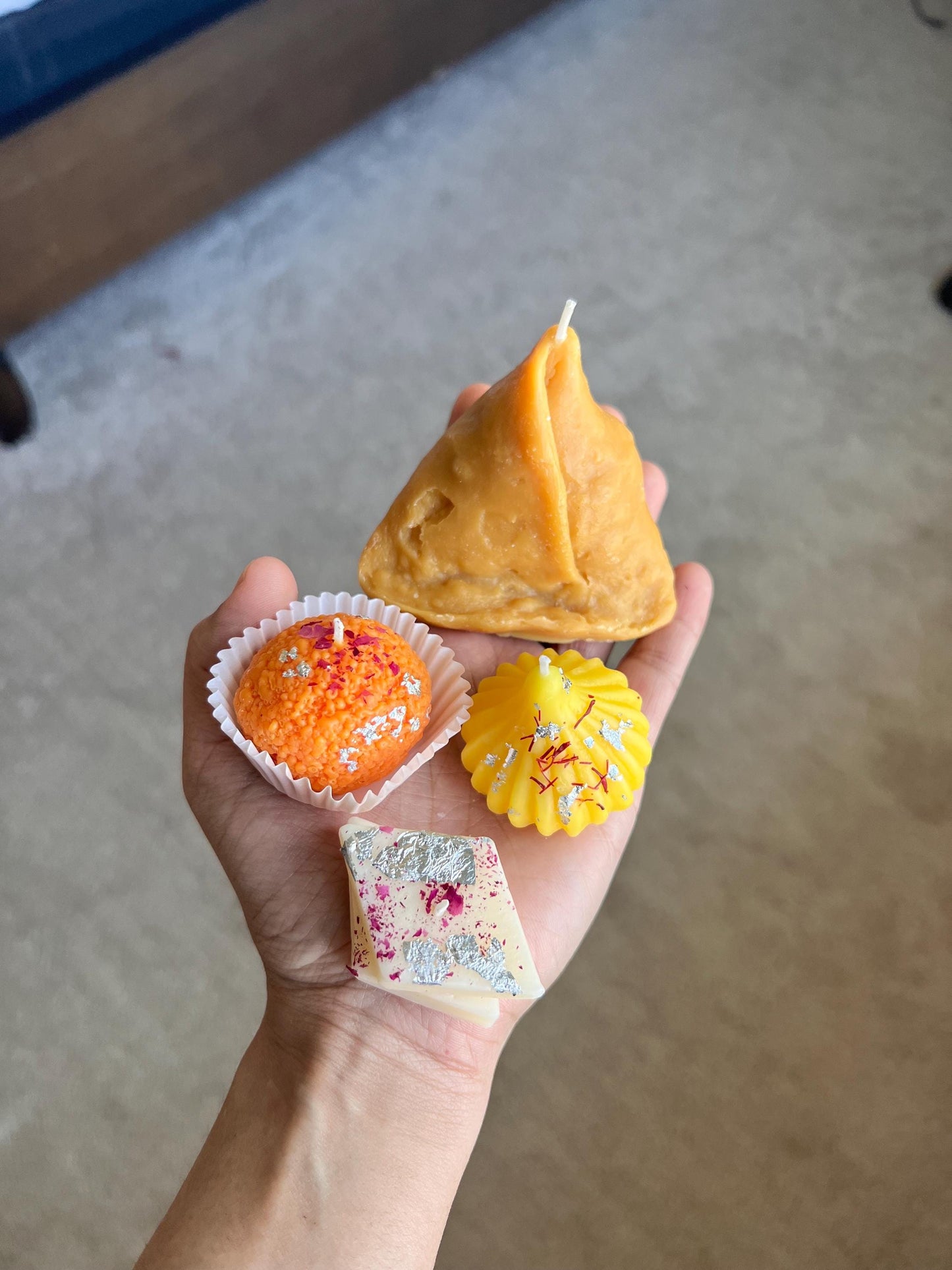 10 box with orange ladoo, kaju katli, gujiya, and yellow modak (40pcs)