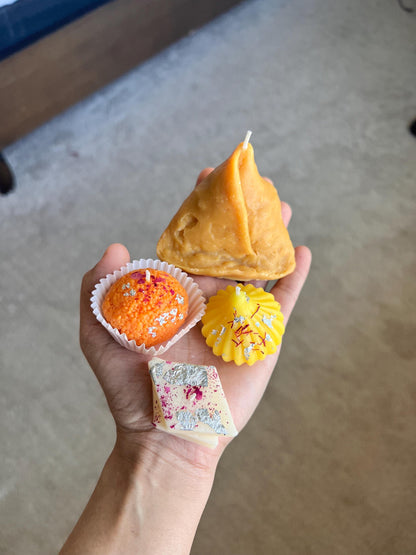 10 box with orange ladoo, kaju katli, gujiya, and yellow modak (40pcs)