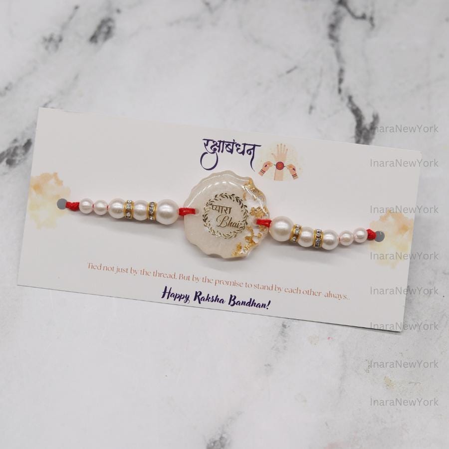 Resin Rakhi with Pearls & Gold Flakes — Elegant Raksha Bandhan Rakhi with Gift Packaging